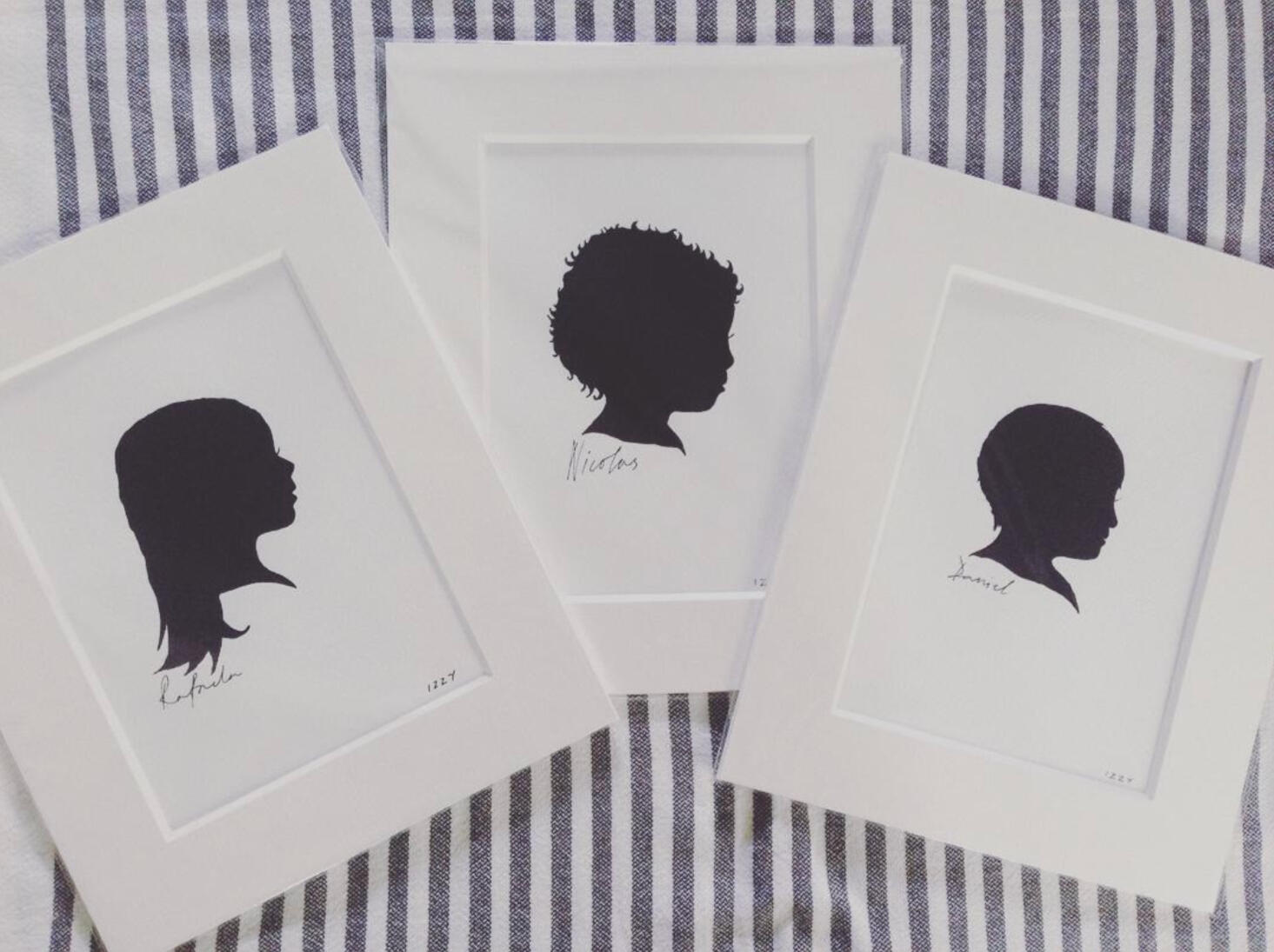 Silhouettes of three brothers